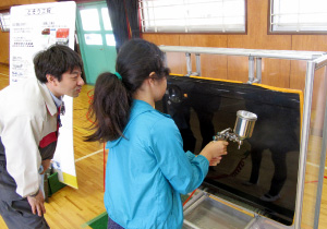 Experiencing painting using a spray gun with water instead of paint